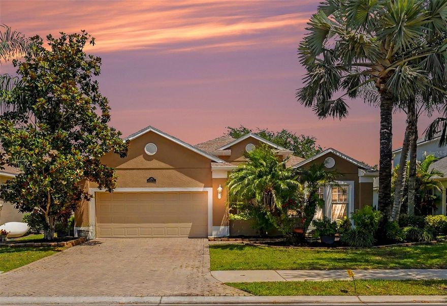 One or more photo(s) has been virtually staged. Lakefront residence featuring 3 bedrooms, a dedicated den, and 2 bathrooms across just over 2,276 sq ft, complete with a private pool and jacuzzi for relaxed outdoor living. Offers 1% lender credit at closing.

Inside, the home is designed with an open great-room layout and a separate formal dining area, enhanced by volume ceilings, crown molding, diagonal-set neutral tile, plantation shutters, and custom designer paint. The gourmet kitchen is appointed with oak cabinetry, granite countertops, and stainless steel appliances. The primary suite enjoys tranquil lake views along with dual walk-in closets and a spacious five-piece bath with a soaking tub and separate shower. A split-bedroom floor plan provides added privacy, while the den also captures calming water views. The screened lanai extends the living space outdoors, overlooking the pool and peaceful lake scenery.

Situated within Grayhawk Landings, a gated 960-acre community surrounded by lakes and woodlands, residents have access to more than five miles of walking and biking trails along with resort-style amenities including multiple clubhouses, swimming pools with waterslides, spa facilities, tennis and pickleball courts, basketball courts, fitness center, playgrounds, and soccer fields. Conveniently located just east of I-75, the community is also close to highly rated schools, shopping, and dining, offering both comfort and convenience in a highly desirable setting.