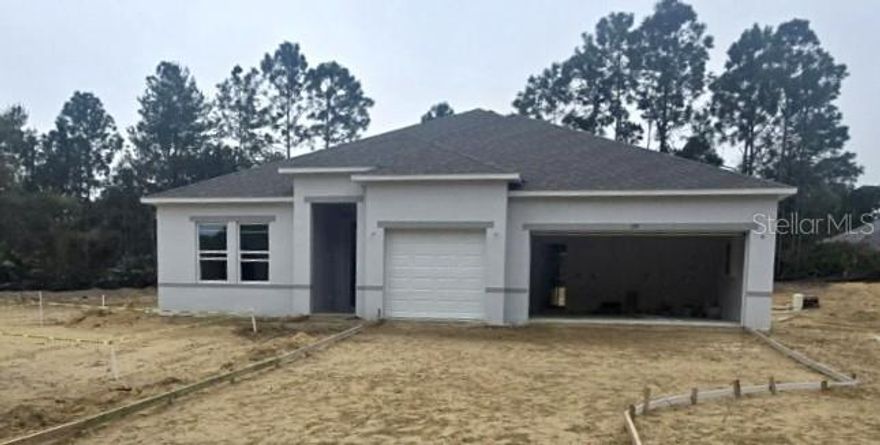 Under Construction. An exceptionally oversized homesite sets the stage for endless possibilities, with ample room for a boat, RV, and more, all while enjoying the coastal charm of Edgewater. Known as the Local’s Choice for East Coast beaches, this waterfront community rests along the tranquil Indian River in Florida and is celebrated for its relaxed atmosphere, scenic parks, nature trails, and proximity to some of the region’s most beautiful shorelines. Local boutiques, waterfront dining, and year round community events create a vibrant setting surrounded by natural beauty.

The Wilmington plan showcases impressive design and thoughtful upgrades throughout. A striking 8 foot front door opens to soaring 9 foot 4 inch ceilings, enhanced by deluxe trim and cordless blinds that elevate every space. The great room flows effortlessly into a gourmet kitchen featuring the builder’s upgraded configuration with wall oven and cooktop, abundant cabinetry, and generous workspace designed for both everyday living and memorable gatherings.

Privacy and comfort are beautifully balanced with a split bedroom layout. The primary suite becomes a peaceful retreat with upgraded cabinetry, enhanced countertops, dual split vanities, and an oversized tile shower as part of the deluxe bath option. On the opposite side of the home, two additional bedrooms are thoughtfully positioned alongside a full bath and convenient linen closet, creating a well organized and functional private wing. The fourth bedroom features its own private bath, adding another level of comfort and flexibility.

Outdoor living is just as impressive, beginning with the welcoming covered front porch and continuing to the oversized screened patio that extends the living space into the outdoors. Hurricane shutters provide added peace of mind, while professional landscaping and irrigation complete the exterior with lasting beauty.

An oversized three car garage delivers outstanding space for storage, hobbies, and vehicles. Every detail of this Wilmington plan reflects quality construction, elevated finishes, and the added confidence of a full builder warranty, all set within one of the most desirable coastal locations on Florida’s East Coast.