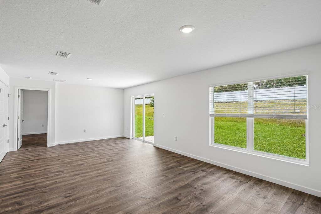 Photo of 1088 Bear Hammock Drive, Umatilla, FL 32784 (MLS # O6429048)