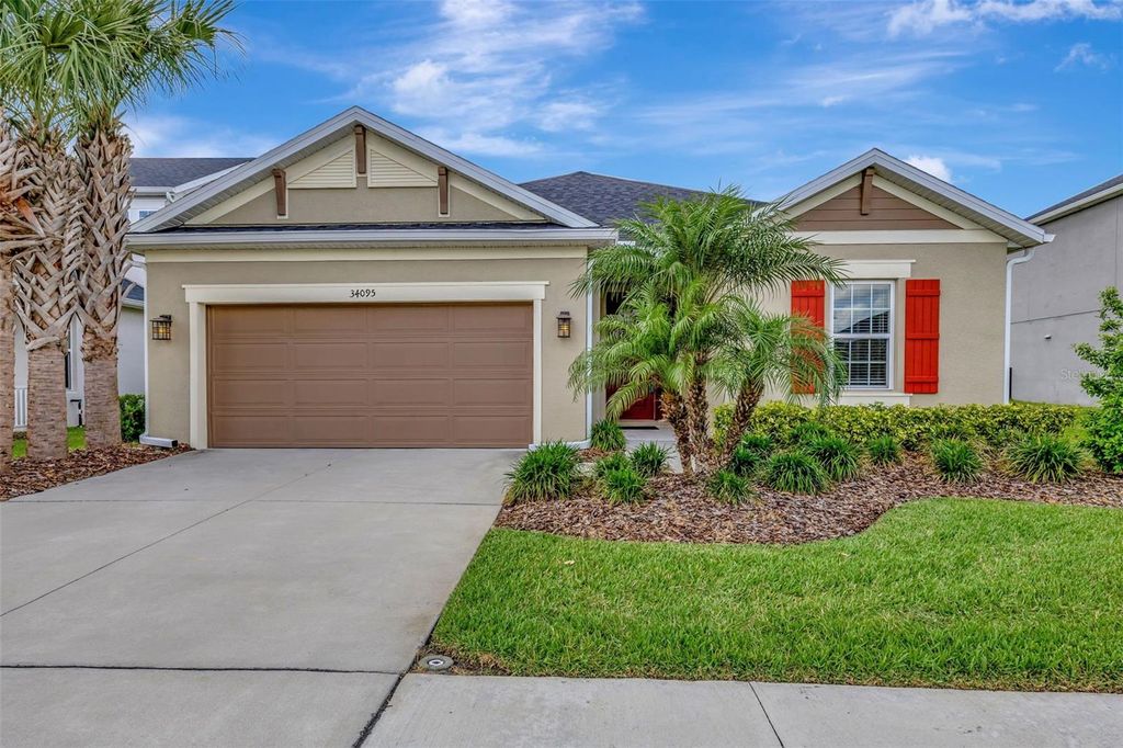 Photo of 34095 Astoria Circle, Wesley Chapel, FL 33545 (MLS # TB8373401)