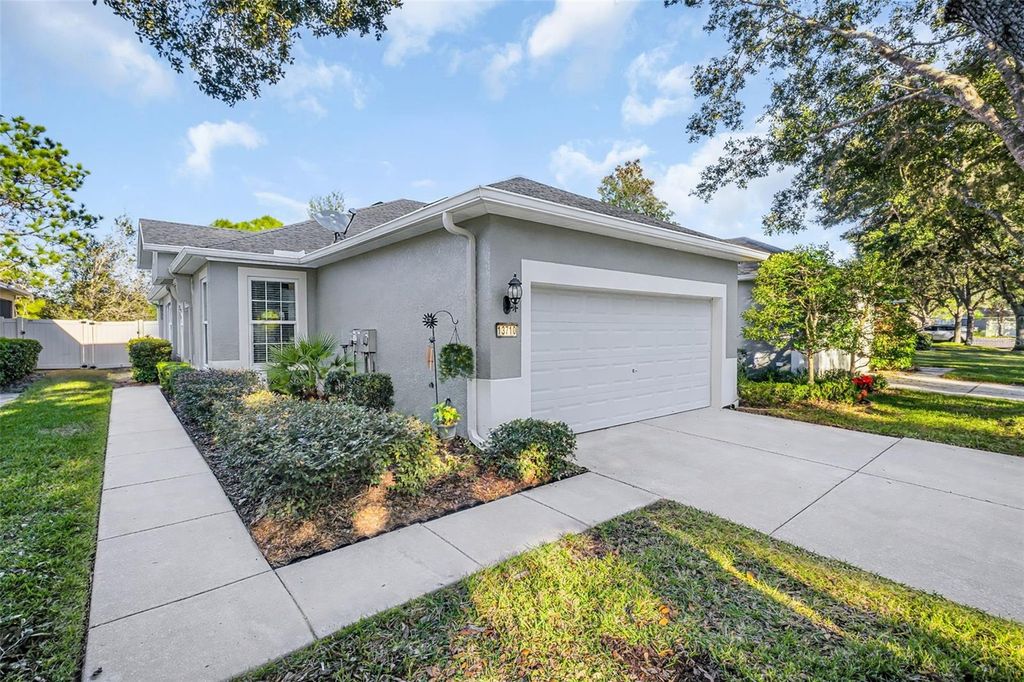 Photo of 13710 Crest Lake Drive, Hudson, FL 34669 (MLS # TB8473023)