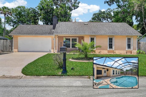 Photo of 1017 E Indian Oaks, Daytona Beach, FL 32117 (MLS # V4949832)