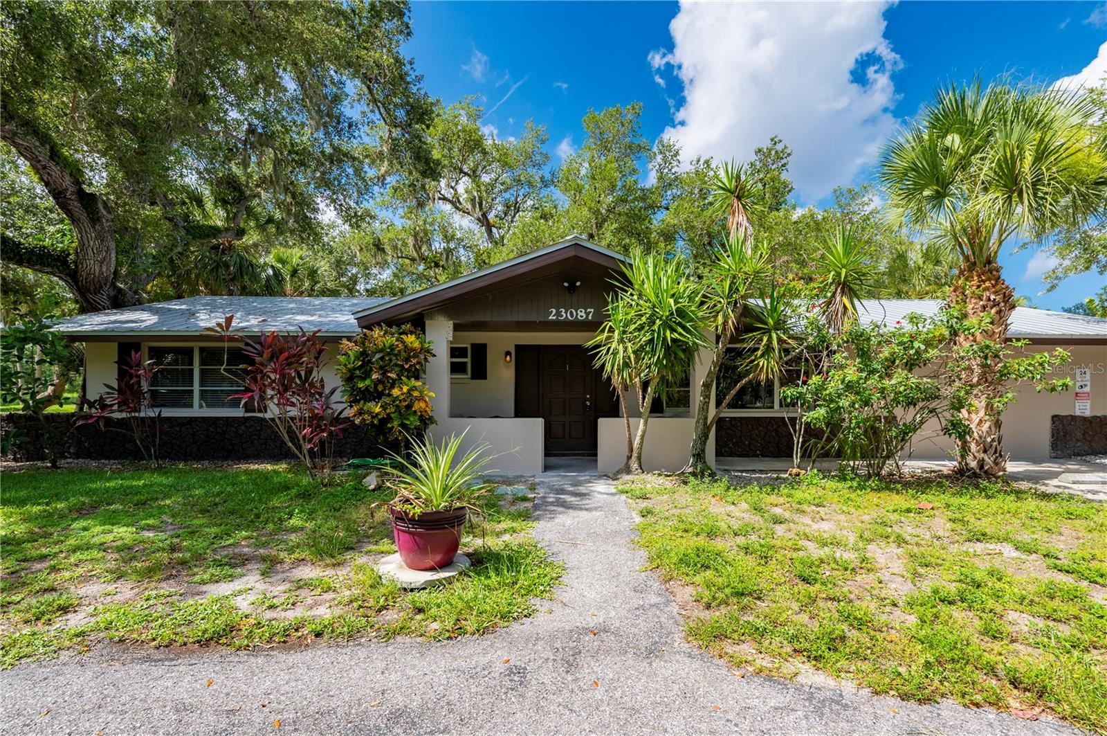 Triplex located in Charlotte Harbor and is within two blocks to Sunseeker, and a short Drive to Shopping, Dining, Punta Gorda and more, what an Ideal Location for an Investor looking for prime rental income. This Triplex offers Three (3) Units, plus a coin operated Laundry room with 2 new Washers and 2 new Dryers for the tenants, offering more income to the new owner. Unit #1 *** is a One (1) Bedroom, One (1) Bath with a Office or could be 2nd Bedroom, but does not have a closet, spacious Living Area and Kitchen with Breakfast Bar. Unit #2 ****which is a Studio and has a Stove, Microwave and Refrigerator. Unit #3**** is a Two (2) Bedroom, One (1) Bath with spacious Living Area and Kitchen. The entry points have Flood Gates installed, plus there is a common area for tenants outside and a paved area for possible more parking. With completing the few items remaining, you will be able to get these units rented very quickly.