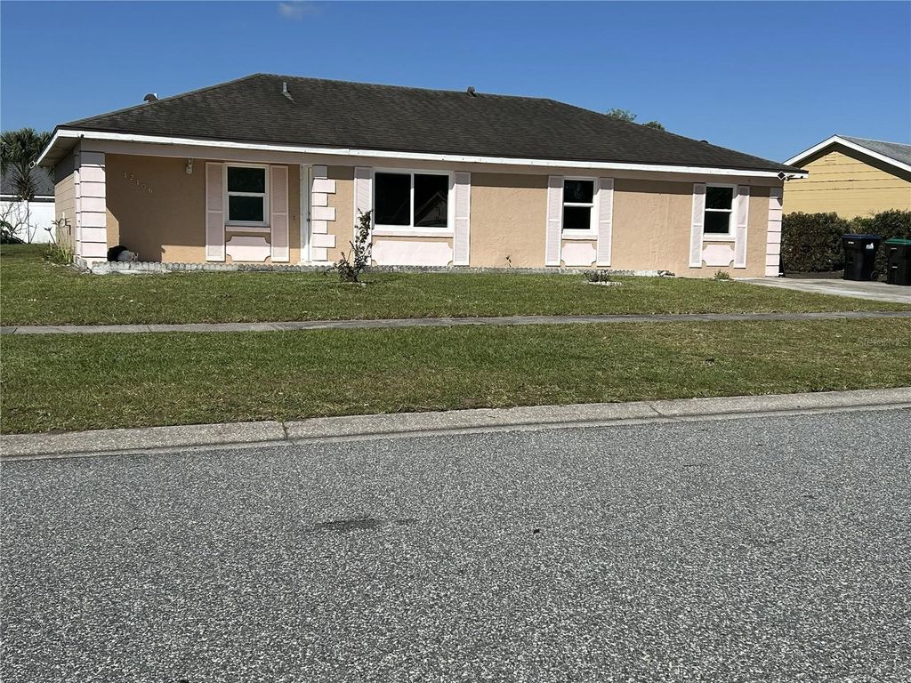 Photo of 12106 Club Woods Drive, Orlando, FL 32824 (MLS # O6407026)