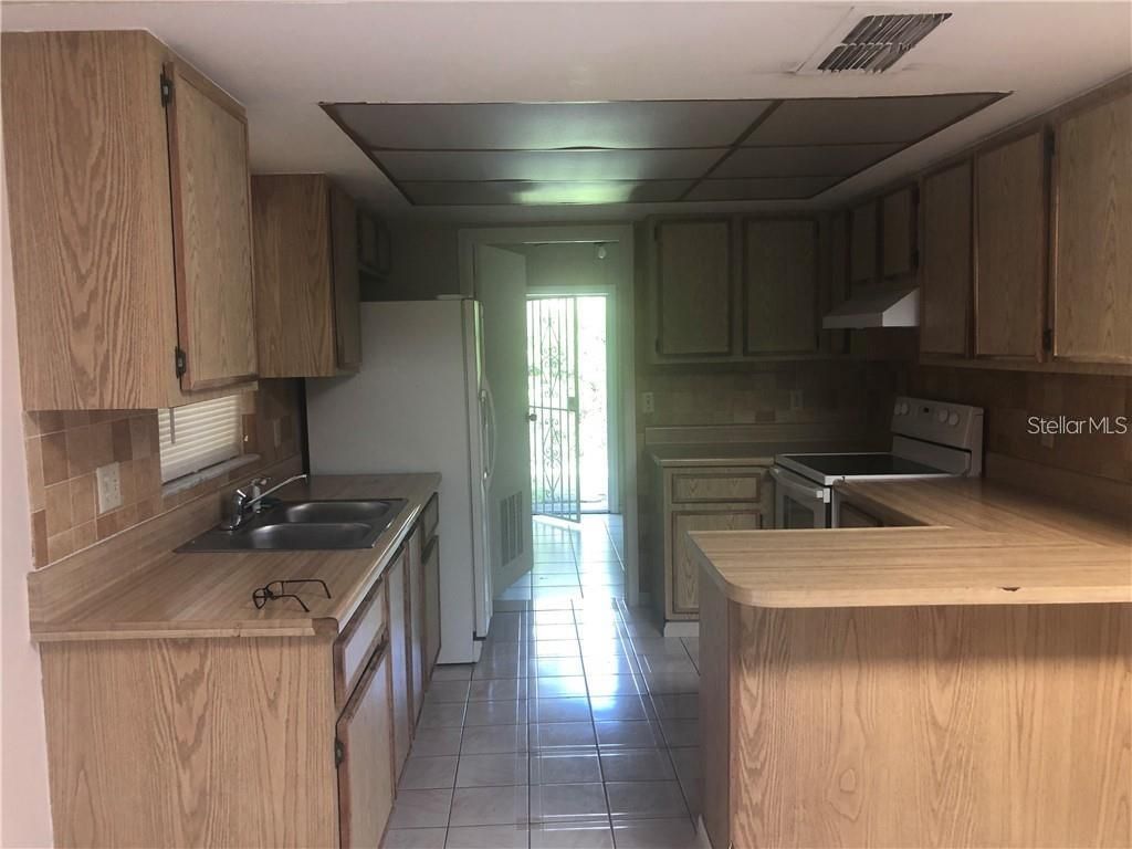Photo of 12106 Club Woods Drive, Orlando, FL 32824 (MLS # O6407026)