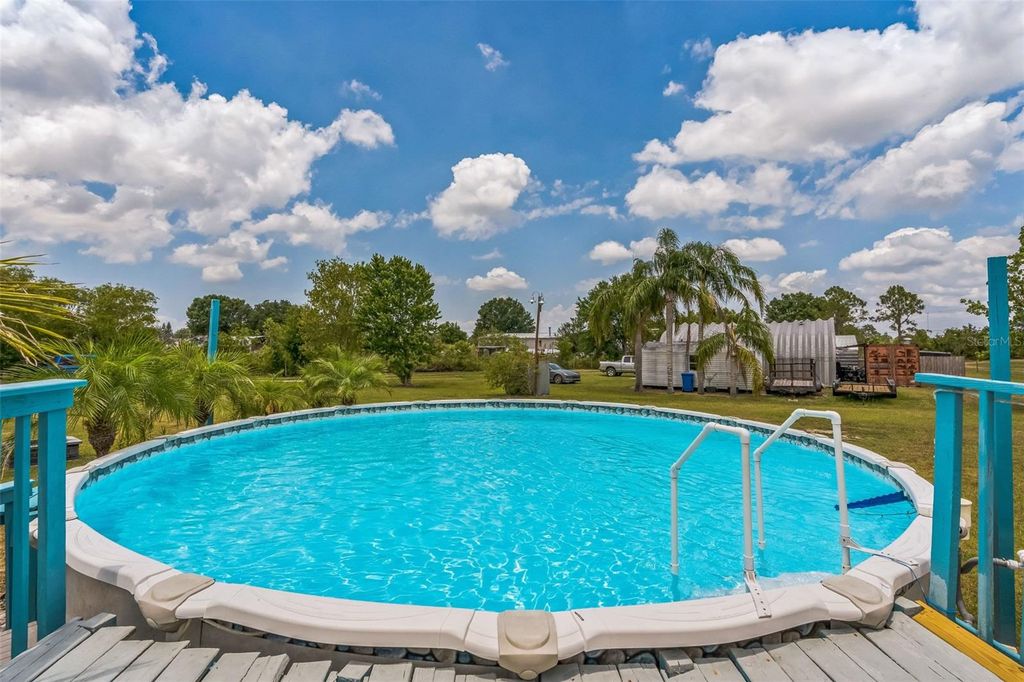 Photo of 14911 Valencia Tree Lane, Wimauma, FL 33598 (MLS # TB8383197)