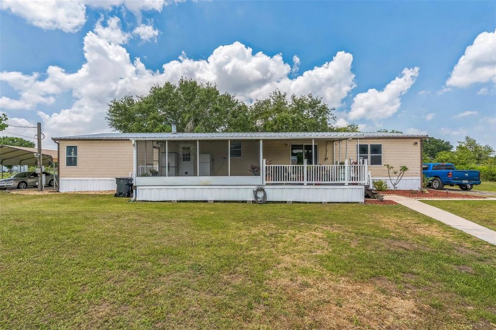 Photo of 14911 Valencia Tree Lane, Wimauma, FL 33598 (MLS # TB8383197)