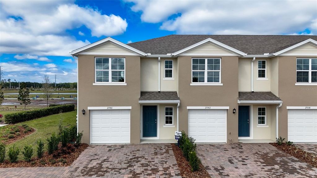 Photo of 2943 Brie Hammock Bend, Harmony, FL 34773 (MLS # O6353466)