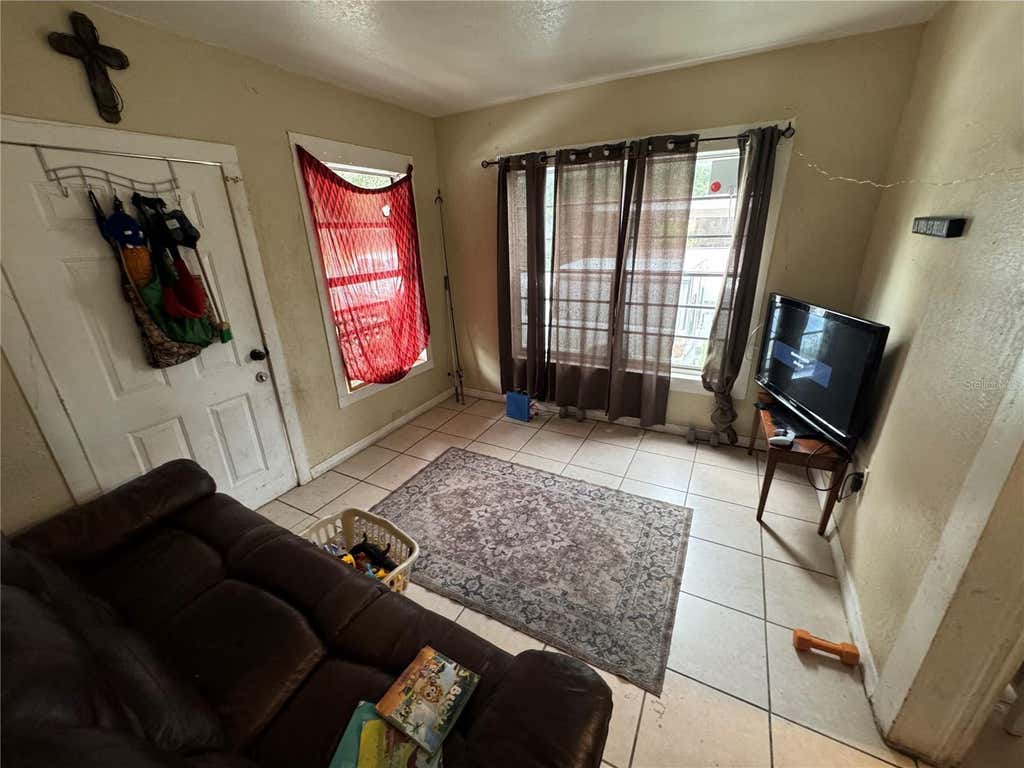 Photo of 711 E 5th Street, Sanford, FL 32771 (MLS # O6435480)