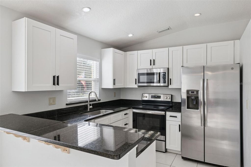 Photo of 3861 Bentford Court, Orlando, FL 32817 (MLS # O6388156)