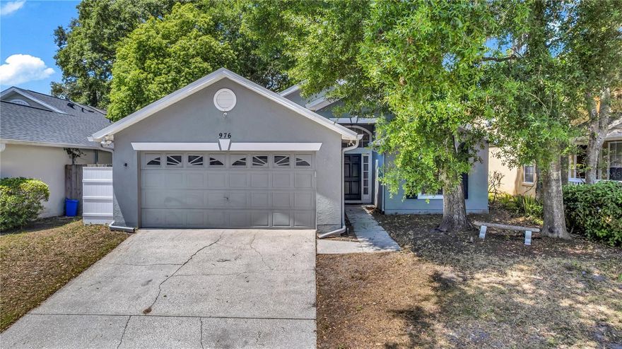 Step into your dream home at 976 Royal Oaks, where every corner tells a story of comfort and joy. Nestled in one of Apopka's most sought-after neighborhoods, this beautifully maintained three-bedroom, two-bathroom retreat is not just a house it's a lifestyle waiting to be embraced. Imagine driving down the tree-lined streets of Royal Oak Estates, where the charm of oversized lots and well-kept landscapes welcomes you home. Just minutes away from thrilling theme parks and delightful dining options, you'll find the perfect balance between excitement and relaxation. As you enter, the freshly painted interior greets you with warmth and elegance. The home features a thoughtful split floor plan that seamlessly connects living spaces. Picture hosting family dinners in the formal dining area, while the large eat-in kitchen, equipped with wood cabinets, ample counter space, and stainless steel appliances, beckons you to whip up culinary delights. The spacious living room, enhanced by delightful skylights, bathes in natural light, creating a perfect atmosphere to unwind. For cozy evenings, the large family room, complete with a charming fireplace, invites you to gather around with loved ones, sharing laughter and stories. Retreat to the primary bedroom, your personal sanctuary, where a huge en-suite bathroom awaits. Here, indulge in the luxury of a double vanity, a soothing soaking tub, and a separate shower. A generous walk-in closet offers ample space for your wardrobe, ensuring everything is neatly tucked away. With no carpet to worry about, the home features easy to maintain vinyl flooring throughout, complemented by tile in the bathrooms. Recent updates, including a new AC, roof installed in 2025, and an updated electrical system 2026, provide peace of mind as you move into this stunning home. The newly installed privacy fence enhances your outdoor living experience, allowing you to enjoy Florida's beautiful weather year-round in your own private paradise on the screened lanai.
Take advantage of the community amenities, including a sparkling pool and courts for tennis and pickleball, perfect for staying active and socializing with neighbors. Here you're not just buying a property. You're investing in a lifestyle filled with happiness, community, and endless possibilities. Are you ready to turn the key to your new beginning?