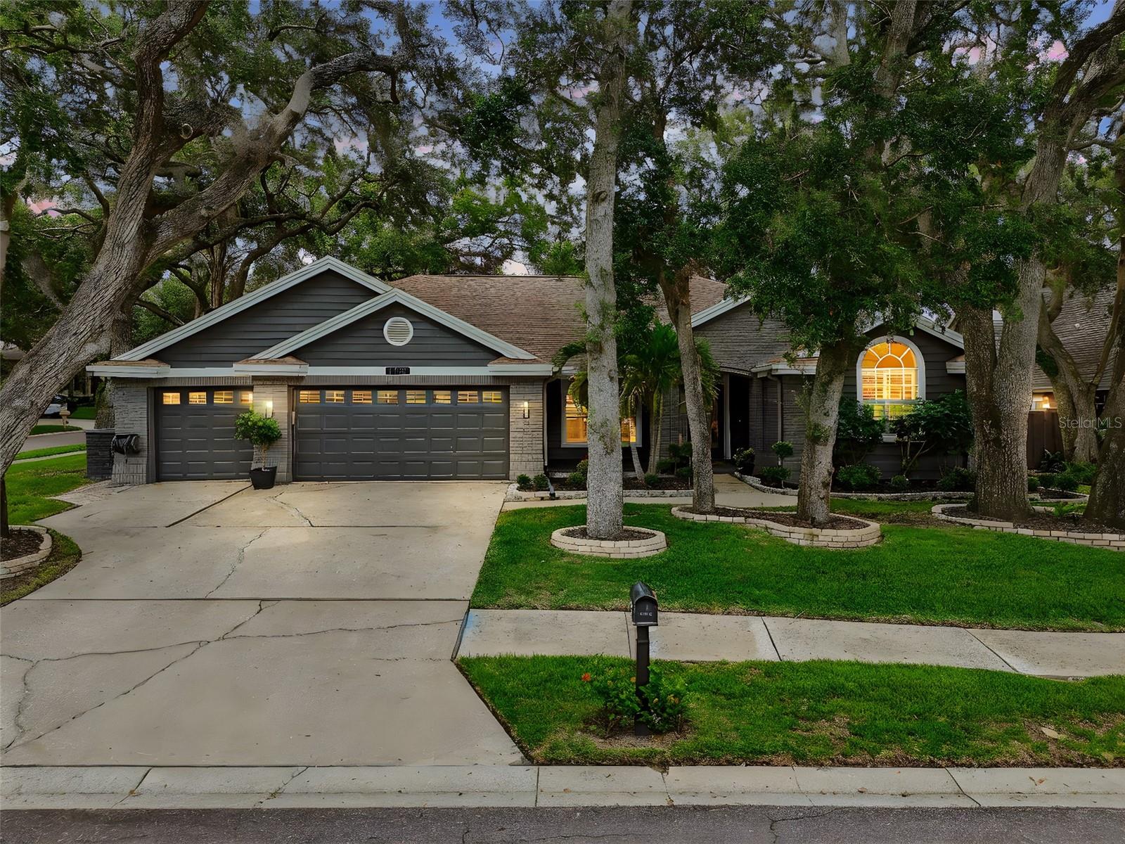 PRICED TO SELL! The home of your dreams awaits in one of Safety Harbor’s most coveted neighborhoods! Welcome to La Forest at Green Springs, an exclusive community of just 43 luxury homes offering privacy and charm in the heart of Safety Harbor. Enjoy a location that feels secluded yet is only minutes from Downtown Safety Harbor, Philippe Park, waterfront trails, boutique shops, and top-rated dining.
This move-in ready 4BR/3BA pool home with a 3-car garage sits on a spacious corner lot surrounded by lush landscaping. Inside, you’ll find soaring ceilings, an open layout, and a stunning wood-burning fireplace. The gourmet kitchen features 42” shaker cabinets, granite countertops, custom pantry, center island, Wi-Fi-enabled appliances, and a stylish backsplash—perfect for entertaining and everyday living. The elegant primary suite offers dual closets, a jetted soaking tub, and a walk-in shower for a spa-like experience.
Step outside to your private outdoor oasis: a sparkling saltwater pool & spa with sun shelf and bubblers, low-maintenance turf, new pavers, and full landscape lighting—all designed for relaxation and Florida living at its finest.
UPGRADES GALORE: Trane 15 SEER HVAC (2021), full interior/exterior paint, new fans and lighting, updated plumbing fixtures, Wi-Fi electrical switches, new baseboards, crown molding, and hardware. Kitchen updates include a new cooktop (2023), built-in microwave/oven (2021), recessed lighting, and a walk-in pantry. Bathrooms feature new tub and tile (2024), new toilets (2024–25), and updated shower door. Exterior upgrades include new landscaping, artificial turf (2022), patio and pool pavers, updated gutters with underground drainage, Pentair salt system (2022–23), Wi-Fi irrigation system (2023–24), and new city water meter (2024).
Electrical panel is ready for a pool heater if desired. No flood insurance required!
This one-of-a-kind home offers luxury, location, and lifestyle—schedule your private showing today!