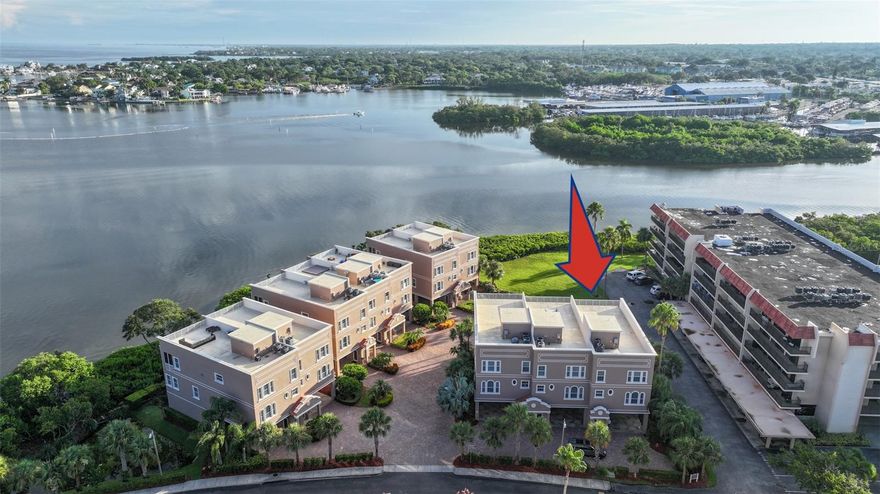 You’ll fall in love with the simple pleasures here—sipping your coffee on the back porch as the boats drift in and out of the marina, watching the tides rise and fall, and savoring those quiet early mornings and golden late afternoons. WATERFRONT COMMUNITY WITH GULF & INTRACOASTAL VIEWS | Discover refined coastal luxury in this 4-story, end-unit townhome (4BR/3BA) with a 2.5-car garage and private elevator in The Reserve at Mediterranean Manors—a coveted Gulf-front enclave in Dunedin. From select rooms and multiple balconies you’ll enjoy sweeping water and sunset views across St. Joseph Sound to the Gulf of Mexico, capped by a rooftop terrace with panoramic Intracoastal and Gulf vistas. More than $200K in thoughtful upgrades include a reimagined chef’s kitchen with quartz counters, rebuilt island, white porcelain farm sink, gas range, and new appliances. Spa-inspired baths feature expanded showers, a standalone tub, floor-to-ceiling tile, and custom mirrors. Additional highlights: wood-look tile throughout, stone gas fireplace with built-ins, custom wet bar with wine fridge, and a showpiece primary closet with quartz-topped island and vanity. Comfort and efficiency abound with TWO new A/Cs (2023), tankless gas water heater, and an EV outlet in the garage. Resort-style amenities: wonderful heated community pool, bocce, tennis & pickleball, private beach, plus kayak storage/launch for effortless days on the water. Premier location minutes to the Pinellas Trail, award-winning beaches, golf, dining, and ~30 minutes to Tampa International. Live the Dunedin coastal lifestyle—where every day ends with a Gulf-view sunset.