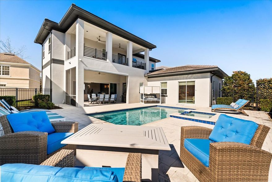 Lifestyle, Luxury and Legacy is what Reunion Resort is famous for and why it is one of the most sought-after communities in the entire Central Florida area.   May I present to you 7638 Excitement Drive.  This custom 5-bedroom home is located in the highly desirable Liberty Bluff Community of Reunion. Being a GOLF COURSE VIEW home that is a private residence, this property marries well thought-out design features throughout that inspire relaxation, versality and class.  The home features an open floor plan with tall ceilings, a custom kitchen and a "length of home sliding glass door" adjacent to the living room that helps the home to transform into an example of what Florida Living should be all about. The first-floor primary bedroom is bright and airy and allows easy access to the private pool and outdoor space.   Also featured on the first floor is a second bedroom, and a ½ bath that is conveniently located near the pool area.  The large lot allows for an oversized two car garage and paver driveway.  The second floor in the home features the remaining bedrooms along with a private balcony and loft area.  The home is in immaculate condition and also features a Generac generator, along with fresh paint, a new water heater, and a motorized privacy screen that allows for evening entertainment or pool side dining. Reunion Resort has everything you want in a community including 3 signature golf courses, world class dining, waterparks, lazy river, water slides, firework viewing areas, tree lined streets, dog park, playground, driving range, golf simulator, member events, in-resort shuttle service, and event space. Live the resort lifestyle like a VIP. NO OTHER RESORT IN THE AREA HAS THIS!!!! Minutes to Disney and close to Beaches, Universal, Legoland and Sea World. Schedule a tour today and prepare for a lifetime of memories.