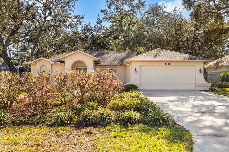 Welcome to this charming and well-maintained 2-bedroom, 2-bath single-family home located at 2396 Galahad Ave, Spring Hill, FL 34608. Perfectly positioned in a peaceful suburban neighborhood, this home offers a comfortable lifestyle with easy access to parks, shopping, and all that Central Florida has to offer. Step inside to discover a bright and inviting layout featuring a kitchen with appliances and ample counter space, ideal for preparing meals and entertaining family and friends. The home has been carefully maintained, ensuring a move-in-ready experience for its next owners. The property features two spacious bedrooms and two bathrooms, providing comfort and privacy. Enjoy Florida living at its best with a screened-in porch—perfect for morning coffee or relaxing outdoors—overlooking a spacious backyard that offers plenty of room for gardening, play, or outdoor entertaining. Recent upgrades include a new roof and new dishwasher, giving peace of mind and modern functionality. Plus, there’s no HOA, allowing for flexibility and freedom in maintaining and enjoying your property. Located near Weeki Wachee Springs State Park, local parks, golf courses, and shopping centers, this home combines a tranquil suburban lifestyle with convenient access to recreation and amenities. With its move-in-ready condition, updated features, and expansive backyard, this Spring Hill home offers the perfect opportunity to enjoy comfortable Florida living.