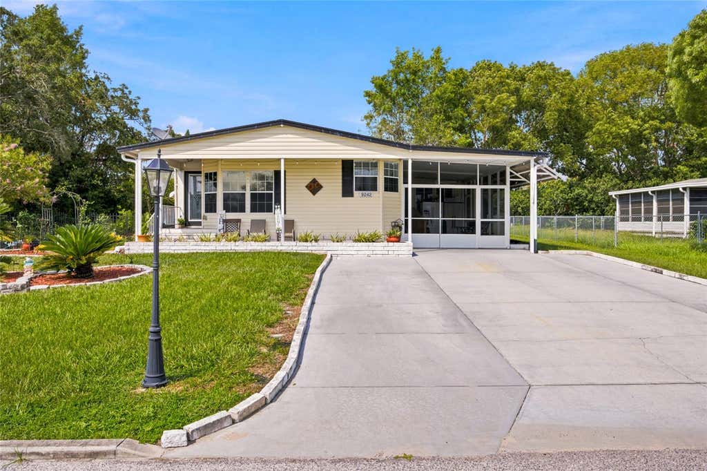 Photo of 9242 Denmarsh Drive, Brooksville, FL 34613 (MLS # TB8533710)