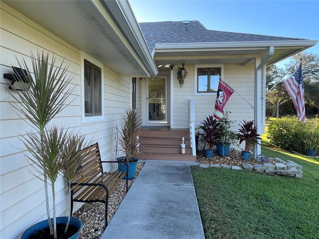 Photo of 1007 Lake Avoca Drive, Tarpon Springs, FL 34689 (MLS # W7880008)