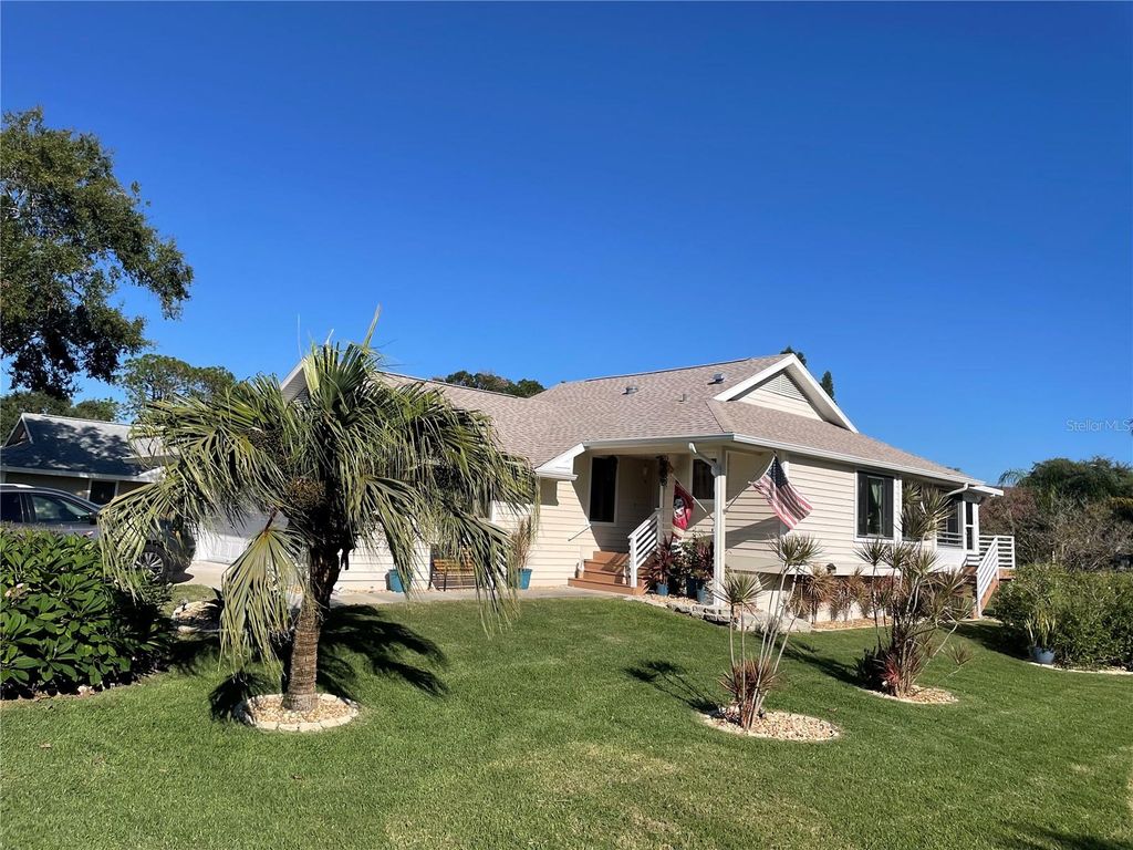 Photo of 1007 Lake Avoca Drive, Tarpon Springs, FL 34689 (MLS # W7880008)