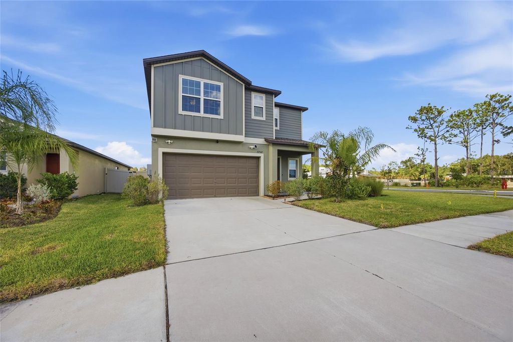 Photo of 22547 Storybook Cabin Way, Land O Lakes, FL 34637 (MLS # TB8449281)