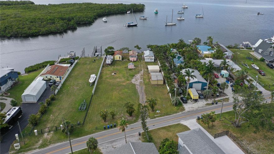 PRIME Location! This parcel is a rare opportunity to own .30 AC of prime real estate on the Little Manatee River within minutes of the Bay and Gulf. It features 51 feet of deep-water access with ample depth to accommodate most large vessels. Build your own dock and lift for a slice of paradise! Shell Point Road in Ruskin is a quiet community with no HOA or CDD. Property is zoned PD, allowing flexible land uses. It is conveniently located minutes from Tampa, Brandon, St Pete, Bradenton, Shell Point Marina, Little Harbor, shopping, restaurants, and healthcare facilities. The potential to own a spectacular piece of paradise doesn't come along often. Now is the time to make the move and start enjoying the dream! All measurements are approximate. Structure is a tear down, please do not enter. RV will be removed. Lot to the right is also available .723 AC TB8472762 or both TB8389115!