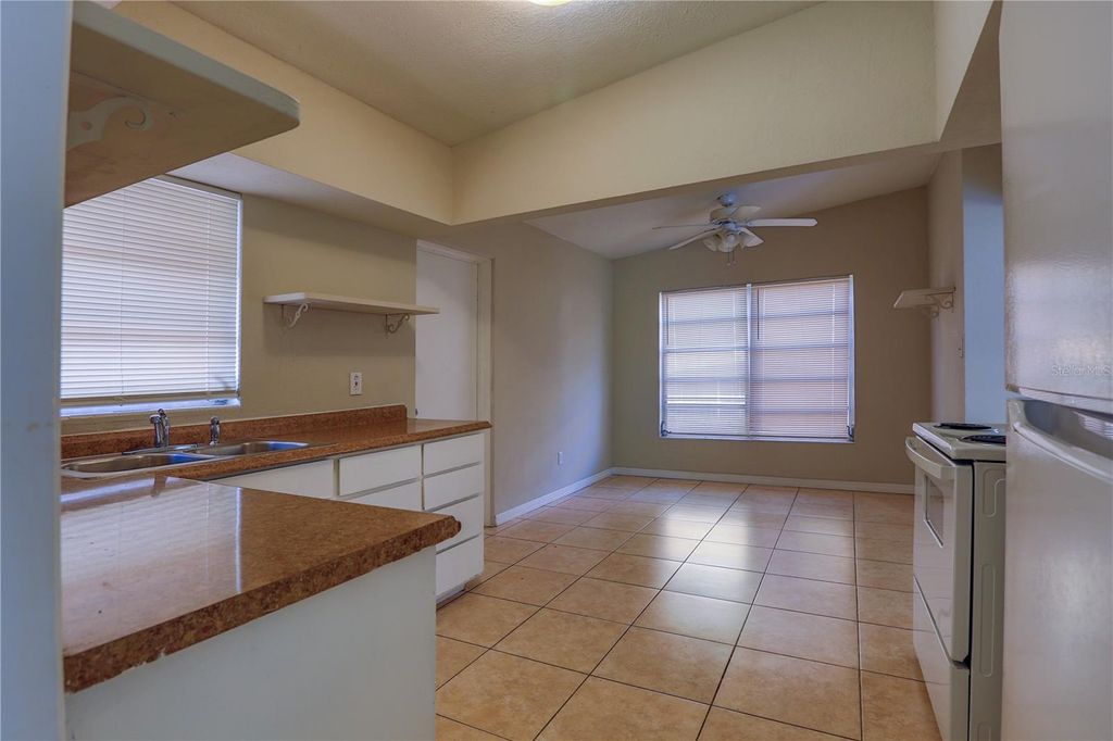 Photo of 6203 Forest Grove Boulevard, Orlando, FL 32808 (MLS # O6362803)