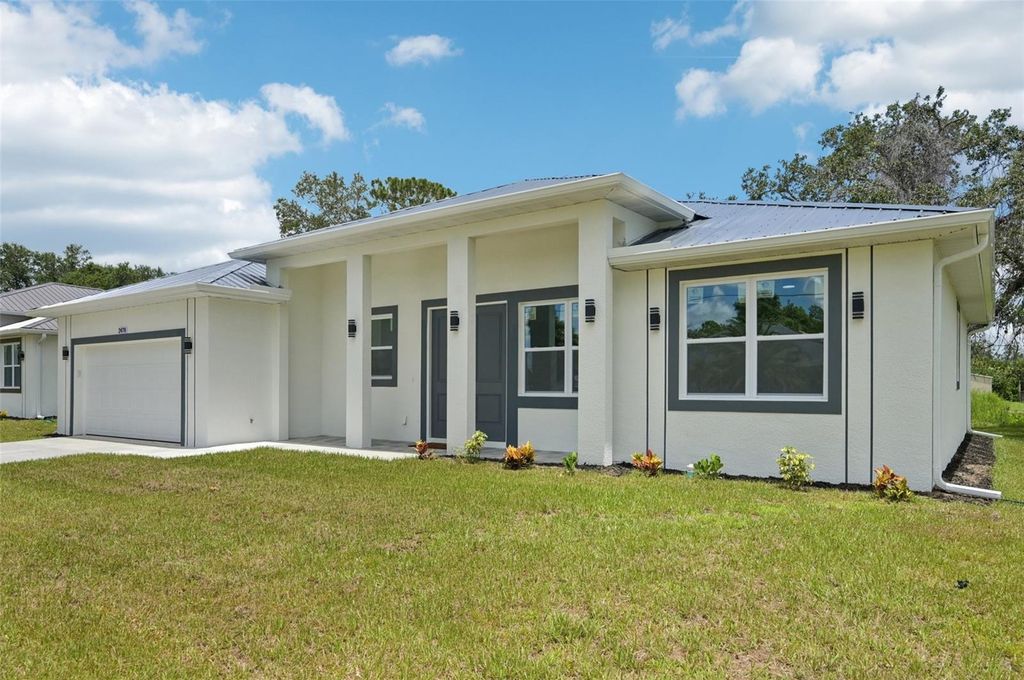 Photo of 2478 Talwood Terrace, North Port, FL 34288 (MLS # A4662824)