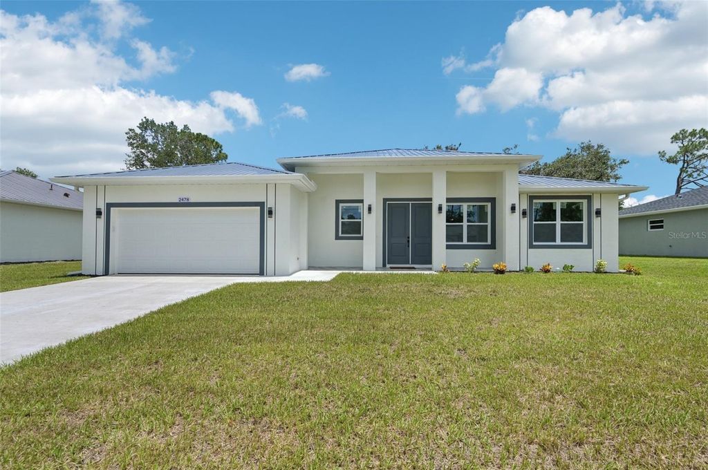 Photo of 2478 Talwood Terrace, North Port, FL 34288 (MLS # A4662824)