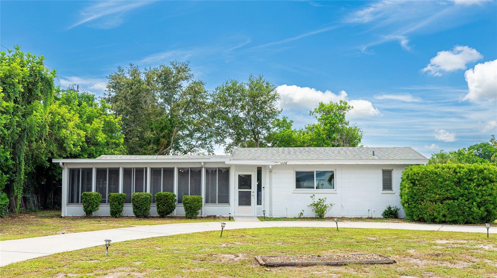 Bring your vision to this light and bright 3/2 perfectly positioned on a spacious corner lot in the friendly community of Bayshore Gardens. Whether you're a savvy investor or a homeowner ready to create your dream space, this home offers the opportunity to make it your own. Located just 15 minutes from the pristine shores of Anna Maria Island and close to shopping, restaurants, Sarasota-Bradenton International Airport, and more — convenience meets potential in this no-HOA neighborhood that allows short-term rentals. As a resident of the Bayshore Gardens Park & Recreation District, you'll enjoy access to a Jr. Olympic-sized pool, playground, picnic pavilions, banquet facilities, a full-service marina, boat ramp, and fishing pier — all with direct access to Sarasota Bay. And the best part? The annual fee of just $417 is already included in your property taxes!