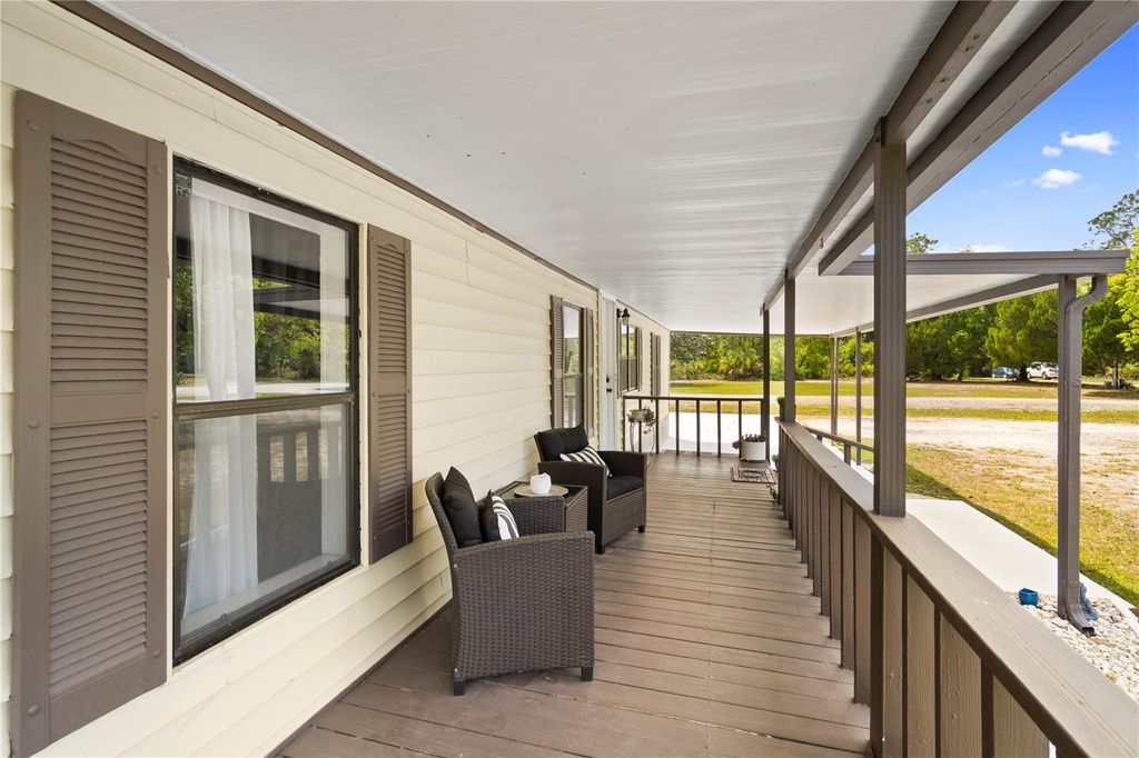 Photo of 8356 W Tawny Rose Lane, Crystal River, FL 34429 (MLS # OM723245)