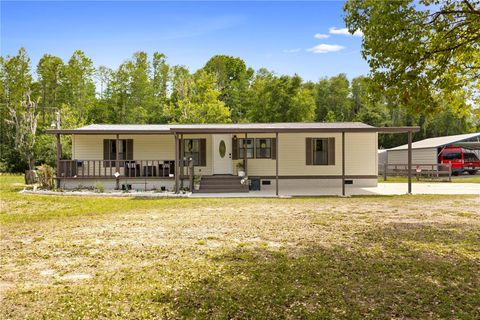 Photo of 8356 W Tawny Rose Lane, Crystal River, FL 34429 (MLS # OM723245)