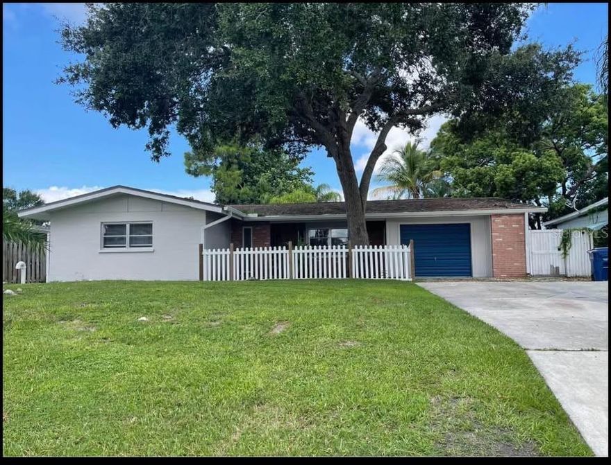 3/2 main home with a detached studio apartment. Completely renovated from top to bottom, this stunning single-family pool home offers modern living in a prime Sarasota location. Inside, you’ll find a brand-new kitchen with quartz countertops, stainless steel appliances, and custom cabinetry. Luxury vinyl flooring runs throughout, complementing the fully updated bathrooms and contemporary light fixtures. Step outside to your private pool overlooking the lake, perfect for relaxing or entertaining. The property also includes a fully updated pool house with new flooring, a full bathroom, and a kitchenette—ideal for guests or extended living. Just minutes from Siesta Key Beach, shopping, and dining, this home combines style, convenience, and the best of Florida living