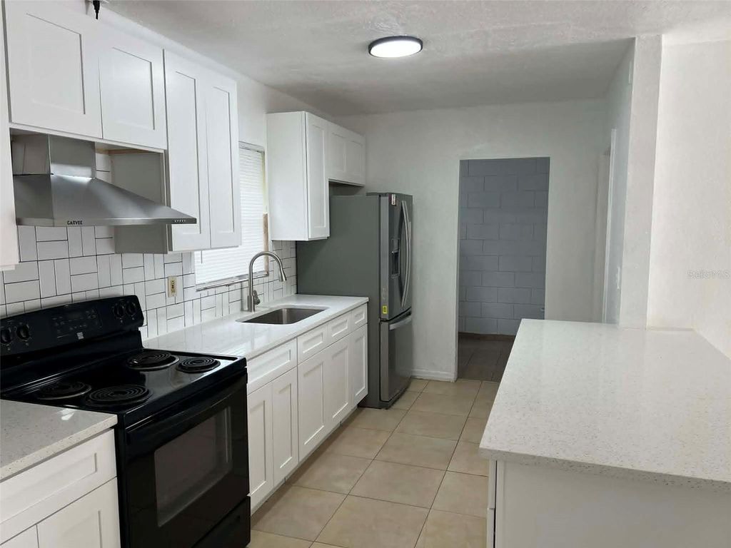 Photo of 4207 Meadowbrook Avenue, Orlando, FL 32808 (MLS # S5148229)