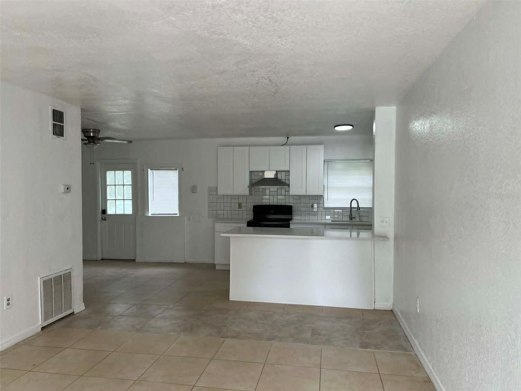 Photo of 4207 Meadowbrook Avenue, Orlando, FL 32808 (MLS # S5148229)