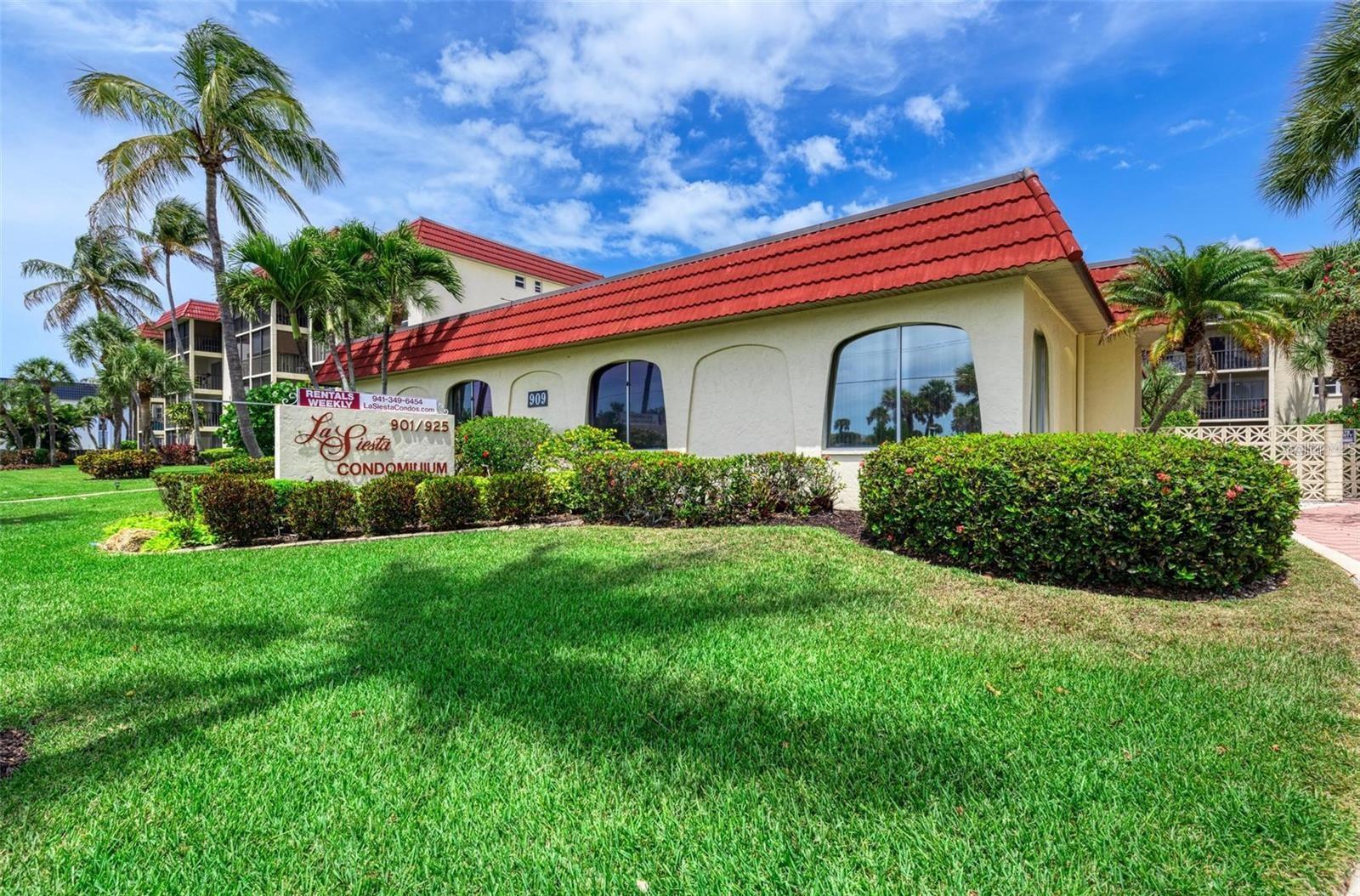 INVESTOR ALERT!! THIS IS THE LEAST EXPENSIVE 2 bed / 2 bath condo on Siesta Key that allows weekly rentals and one pet!! Priced BELOW the 2 bed/1 bath units currently on the market in LA SIESTA makes this the best value on Siesta Key! Offered turnkey furnished, this spacious condo is located DIRECTLY ACROSS from the main entrance of world-renowned Siesta Key Public Beach, providing effortless access to the powdery white sand beach, shimmering Gulf waters, tennis and volleyball courts, food pavilion, playground, and picnic areas. Just one mile from the vibrant shops and dining of Siesta Village, and with a trolley stop right out front, this location is ideal for both personal enjoyment and high-demand vacation rentals. With future reservations already secured and an on-site rental management office, it’s a hassle-free investment opportunity. Additional highlights include: new electrical panel, 2022 water heater, reasonable HOA fees, one small pet allowed under 25 lbs. (with Board approval), access to amenities including heated pool, BBQ area, shuffleboard, corn hole, ping pong table, pool table, clubhouse, fitness center, and lending library. Don't miss your chance to enjoy the Siesta Key lifestyle in one of the island’s most desirable communities.