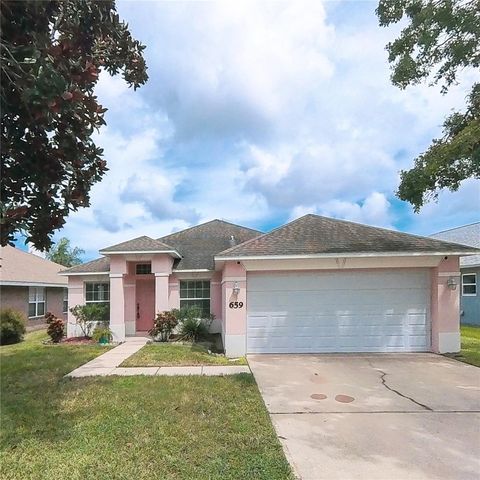 Photo of 659 Coral Trace Boulevard, Edgewater, FL 32132 (MLS # NS1085779) Photo of 659 Coral Trace Boulevard, Edgewater, FL 32132 (MLS # NS1085779)