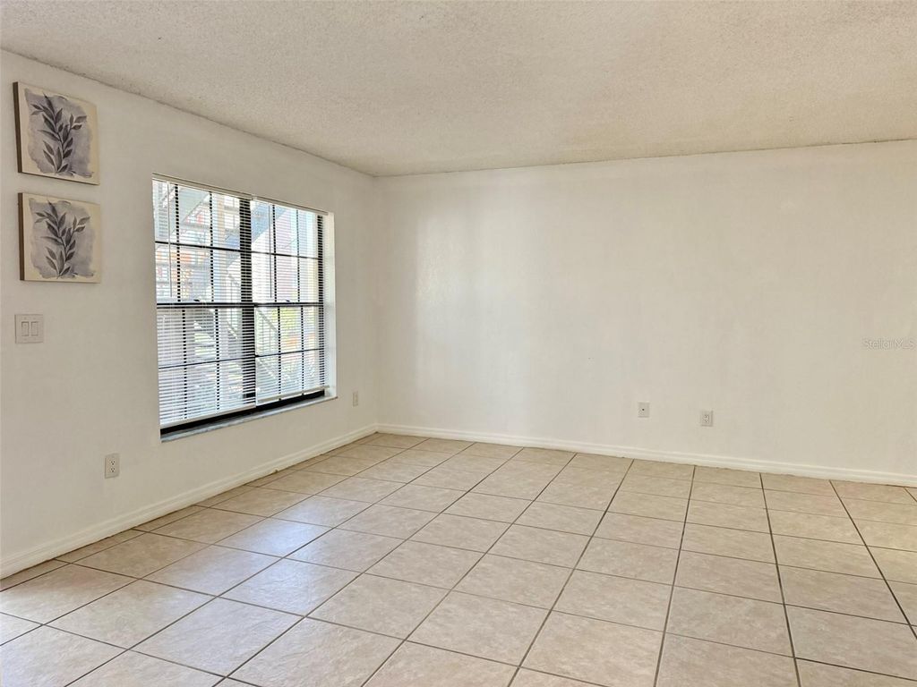 Photo of 21038 Voyager Boulevard #3, Land O Lakes, FL 34638 (MLS # TB8475911)