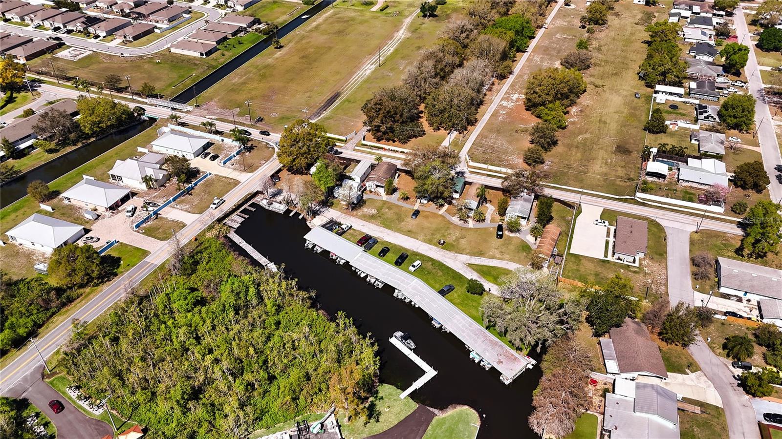 One-of-a-Kind Waterfront Investment Opportunity on the Winter Haven Chain of Lakes!
Discover Cypress Inlet, a rare and exceptional property offering prime waterfront access on Lake Eloise, part of the highly sought-after Winter Haven Chain of Lakes. This unique multi-use investment property provides multiple revenue streams, including vacation rentals, RV site rentals, and boat slip rentals, with significant upside potential for expansion.
Situated on a sprawling waterfront lot, this property features private docks, breathtaking lake views, and direct access to the entire 20-lake system, ideal for boating, fishing, and water recreation enthusiasts. Located just minutes from Legoland and Central Florida’s top attractions, this is a high-demand destination for vacationers and long-term renters alike.
Key highlights include:
Established Vacation Rental Income – Turnkey short-term rental opportunities with high occupancy potential.
RV Site Rentals – Unique waterfront RV spaces with premium amenities.
Boat Slip Rentals – Covered and uncovered slips with consistent revenue potential.
Development Potential – Opportunities for expansion with additional rentals, events, or waterfront activities.
Prime Location – Close to shopping, dining, and major highways, with strong appreciation potential.
This is a rare chance to own a highly versatile, income-producing waterfront property in a market where scarcity drives value. Whether you’re an investor looking for strong cash flow or a visionary ready to unlock new possibilities, Cypress Inlet is a must-see!
Schedule your private tour today!