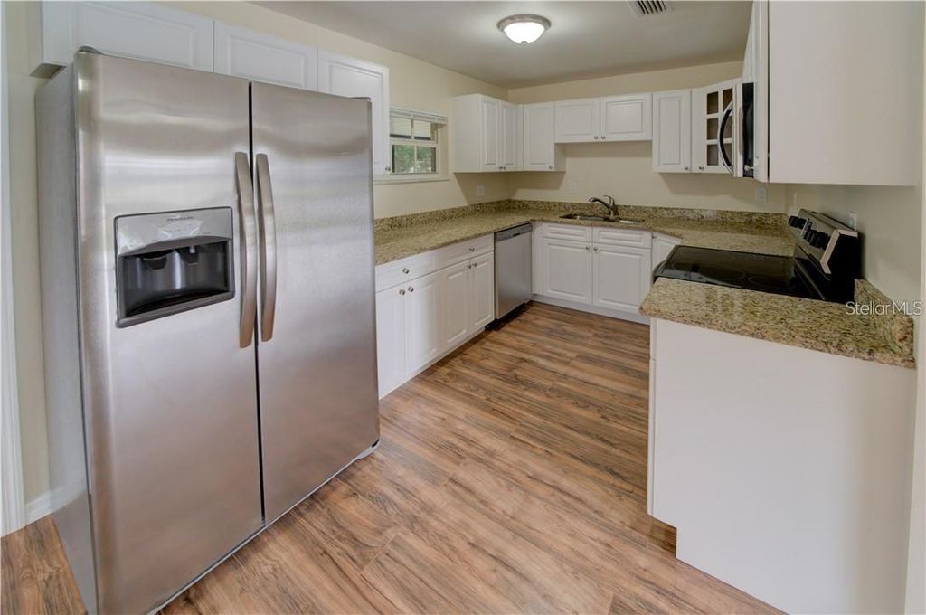 Photo of 6126 Whiteway Drive, Temple Terrace, FL 33617 (MLS # TB8449629)