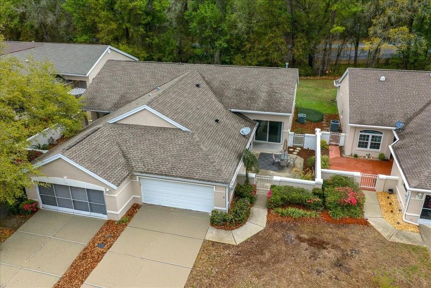 Welcome to this beautifully updated 2-bedroom, 2-bath Nantucket Villa with a full 2-car garage located in the desirable Preserve neighborhood of Oak Run in Ocala. This charming home offers comfortable living space and features numerous upgrades throughout. Upon entry, you are welcomed by high ceilings that create a bright and open feel, enhancing the overall sense of space.

The updated kitchen is a standout with quartz countertops, soft-close solid wood cabinetry, stainless steel appliances, and a large pantry, providing both style and functionality. The home features laminate and tile flooring throughout, creating a clean, low-maintenance living space. The home is also wheelchair accessible throughout the interior, including the kitchen and bathrooms, offering added functionality and ease of movement.

The inviting living area is highlighted by a beautiful electric stone fireplace, perfect for relaxing or entertaining. Enjoy additional living space in the lanai with new sliding doors and windows, allowing plenty of natural light while creating a comfortable spot to unwind.

The primary suite offers a walk-in closet and private access to the back patio, while the updated bathrooms add modern comfort. The spacious 20 x 21 two-car garage provides ample room for vehicles, storage, and workspace. The roof was replaced in 2015.

Living in Oak Run means enjoying a wide range of amenities including 6 pools, 5 spas, 2 fitness centers, 3 clubhouses, a library, billiards room, craft and card rooms, dog park, on-site restaurant, and more than 110 clubs and activities.

Villa owners enjoy low-maintenance living, as the HOA includes lawn care, irrigation, annual exterior power washing, exterior painting every five years, cable TV, trash service, and access to community amenities.

Conveniently located near medical facilities, shopping, and restaurants, this home offers the perfect blend of comfort, convenience, and active community living.