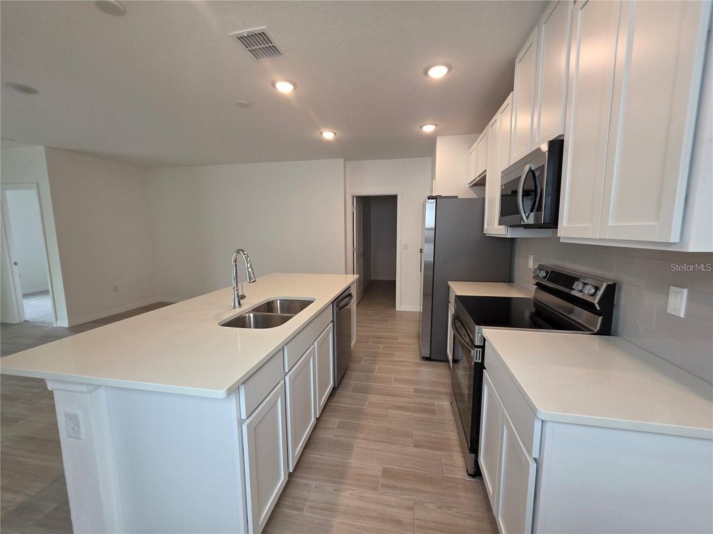 Photo of 5599 Maddie Drive, Haines City, FL 33845 (MLS # O6399890)