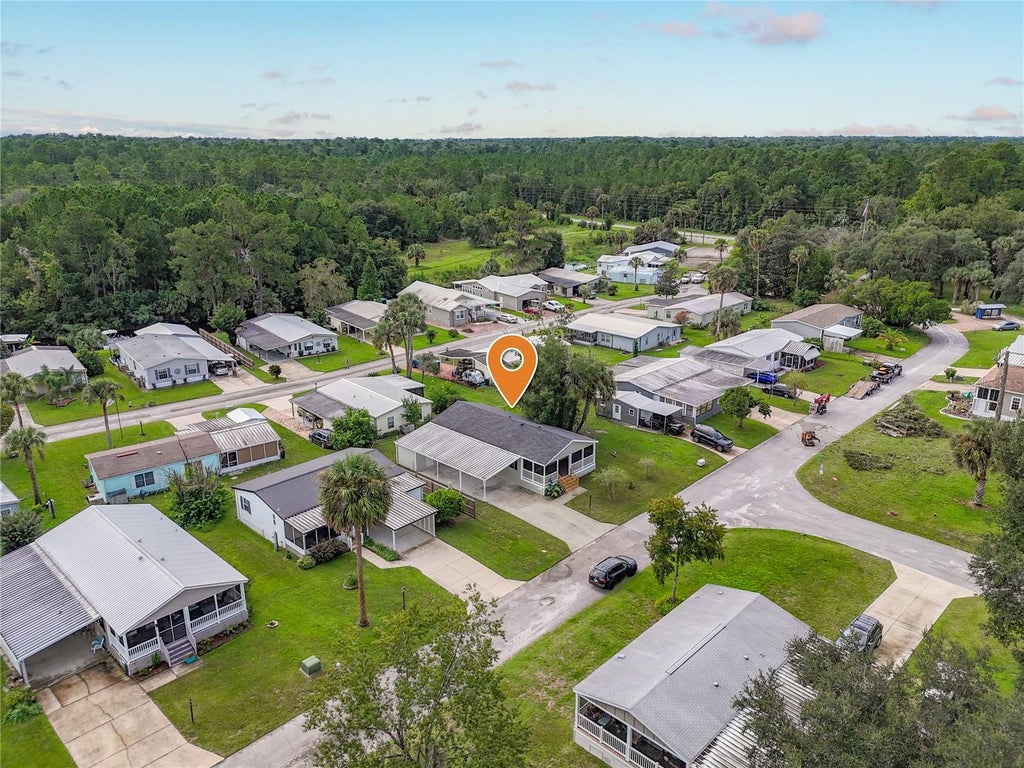 Photo of 108 Pine Lake Drive, Satsuma, FL 32189 (MLS # O6444510)