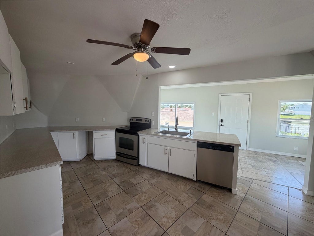 Photo of 4100 Flamingo Boulevard, Hernando Beach, FL 34607 (MLS # O6434797)