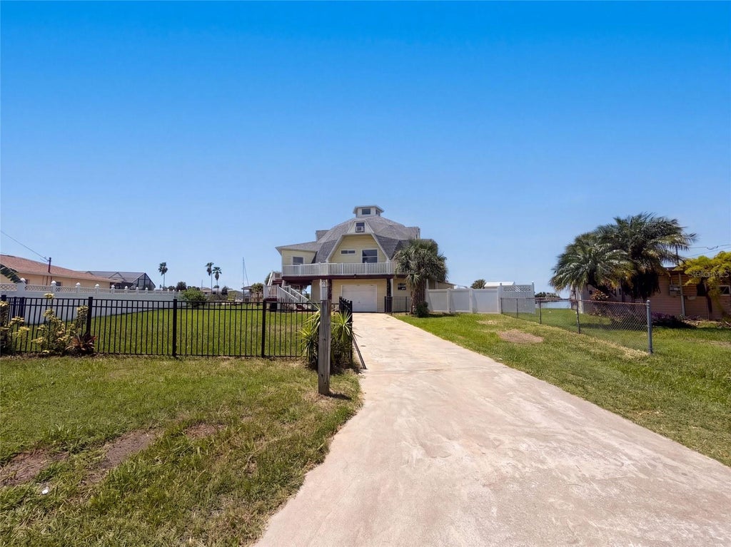 Photo of 4100 Flamingo Boulevard, Hernando Beach, FL 34607 (MLS # O6434797)