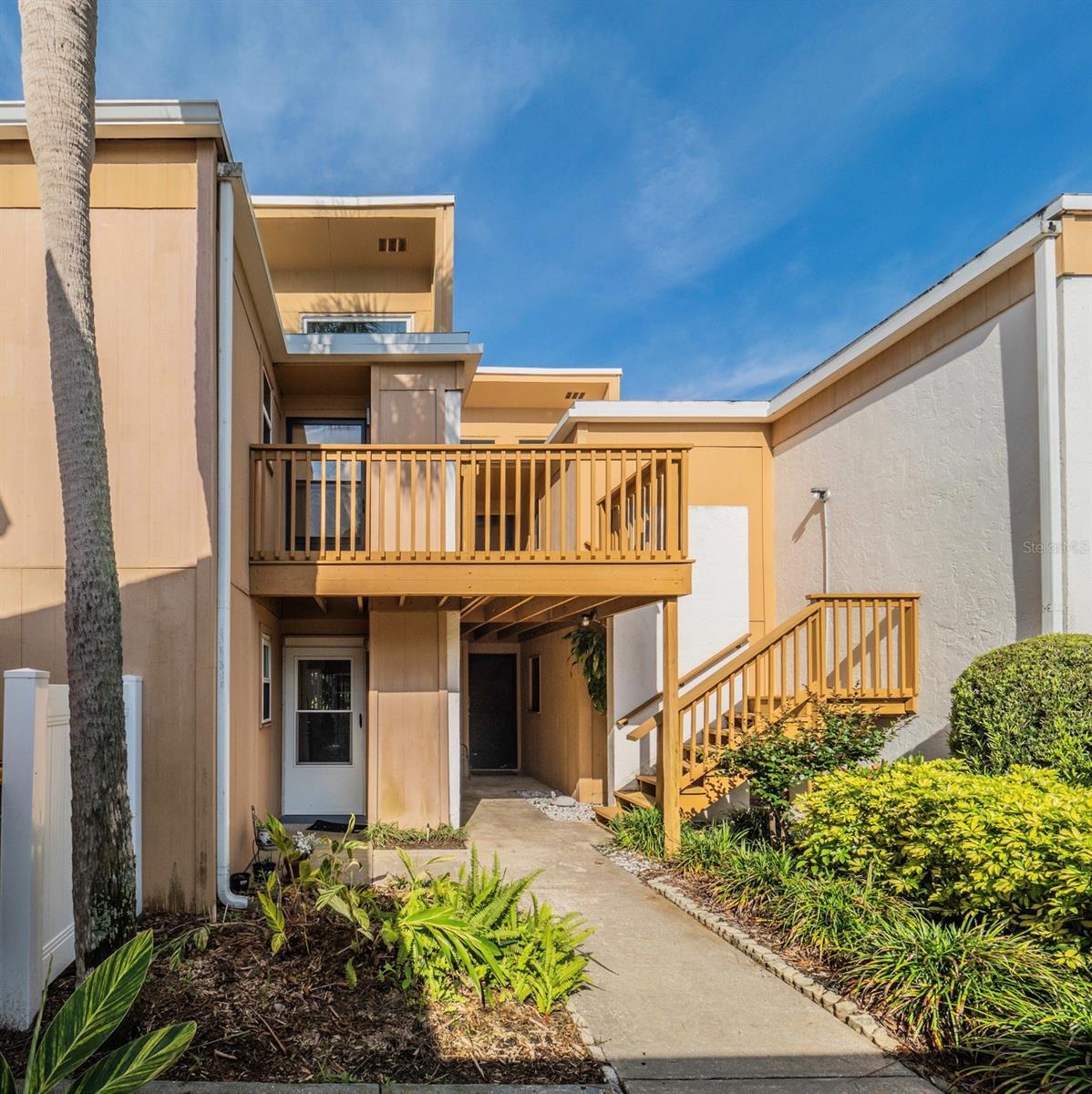 Welcome to this beautifully updated 2-bedroom, 2-bath condo located in the heart of Mount Dora being sold furnished. Set within a charming two-story community, this second-floor unit features an open floor plan with vaulted ceilings and abundant natural light from expansive windows and sliding glass doors. The inviting living room includes a cozy fireplace, while the kitchen offers stainless steel appliances, a breakfast bar, and a pantry closet.
The primary suite provides private access to the back porch, along with a bathroom featuring dual sinks and a walk-in shower. Recent upgrades include a brand-new Amana A/C unit (2024), Renewal by Andersen east-facing living room windows (2022), laminate plank flooring (2021), and updated lighting fixtures in the kitchen and dining areas.
Enjoy relaxing on the spacious back porch with serene views of the landscaped community grounds and pool—an ideal spot to take in Florida’s breathtaking sunsets. Just a short walk to Lake Dora and minutes from downtown Mount Dora’s shops, dining, and cultural attractions, this well-maintained condo offers comfort, convenience, and location. Schedule your showing today!