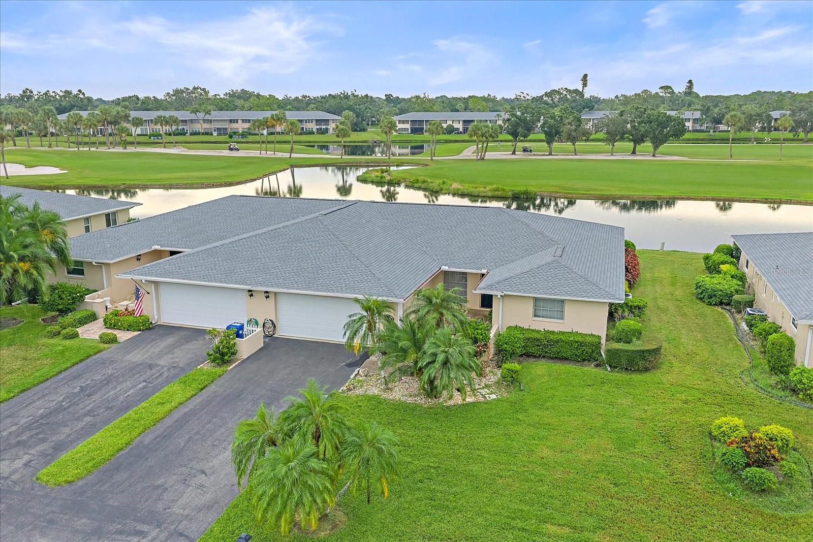 Exceptional opportunity to own this Palm Aire Country Club villa, ideally positioned on the 13th hole with sweeping golf course and water views. This middle-unit villa, one of only nine, offers over 2,100 square feet of living space under air, with the lanai elevated to seamlessly match the main living areas.
Enjoy the benefit of no CDD fees and a Sarasota address while paying Manatee County taxes. The location is unbeatable—just minutes from the vibrant University Corridor with its wide variety of restaurants, shops, Benderson Park, SRQ Airport, and, of course, the world-famous Gulf beaches.
Residents also enjoy a beautiful community pool conveniently located just across the street, perfect for relaxation and socializing. Palm Aire Country Club provides two championship 18-hole golf courses, tennis courts, a fitness center, and a variety of optional membership packages to suit your lifestyle.
Additional highlights include an oversized two-car garage. This property is the perfect blend of comfort, convenience, and resort-style living—ready to be your forever home!