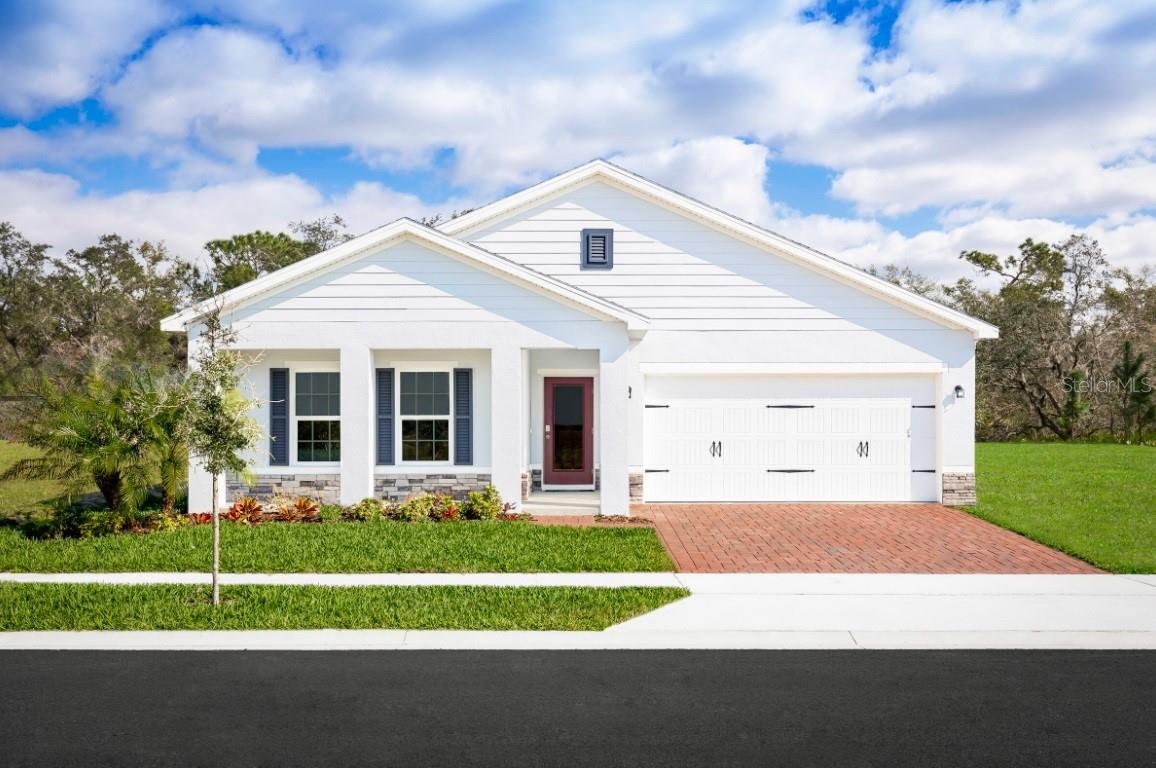 Quick move-in! No rear neighbors. Welcome home to Laurel Glen. New home designs in a CDD-free community near US-27 & Cypress Parkway.Getting around the area will be a breeze, no matter where your travels take you - shopping and dining at Posner Park or Champions Gate, a day trip to Disney or Legoland, or simply running errands close to home. We have a variety of floorplans to fit your lifestyle, and you won't have to compromise on space to stay on budget. You'll love our just-released exterior design options too. Home exteriors feature stone, options for a covered front porch and brick paver driveways. The Mahogany single-family home offers a fresh take on fine living. From your covered front porch or 2-car garage, step into a ranch floor plan that blends convenience and style. There’s plenty of room for family and friends in 2 spacious bedrooms, with a full bath just outside their doors. Gather in your great room for movie nights, and don’t forget to prep popcorn and other delicious snacks on the gourmet kitchen’s large island. Enjoy the night air before heading to bed in your sensational owner’s suite, featuring a walk-in closet and step-in shower. All Ryan Homes now include WIFI-enabled garage opener and Ecobee thermostat. **Closing cost assistance is available with use of Builder’s affiliated lender**. DISCLAIMER: Prices, financing, promotion, and offers subject to change without notice. Offer valid on new sales only. See Community Sales and Marketing Representative for details. Promotions cannot be combined with any other offer. All uploaded photos are stock photos of this floor plan. Actual home may differ from photos.