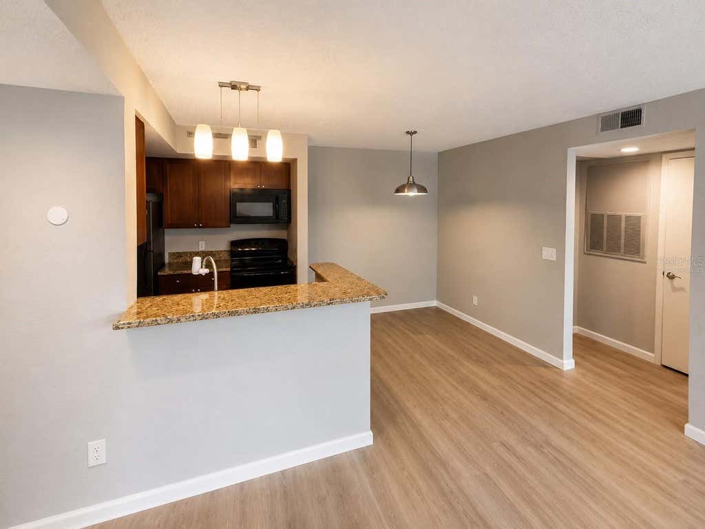 Photo of 5160 Conroy Road #26, Orlando, FL 32811 (MLS # O6424572)