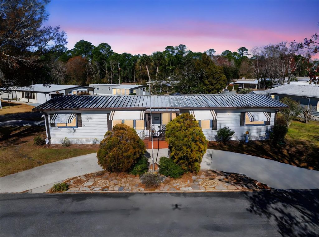 Photo of 232 Meadow Lark Drive, Osteen, FL 32764 (MLS # V4947293)