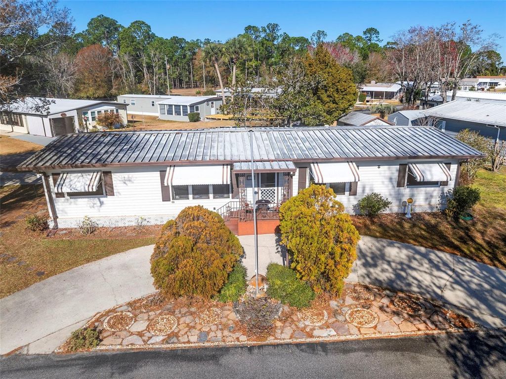 Photo of 232 Meadow Lark Drive, Osteen, FL 32764 (MLS # V4947293)