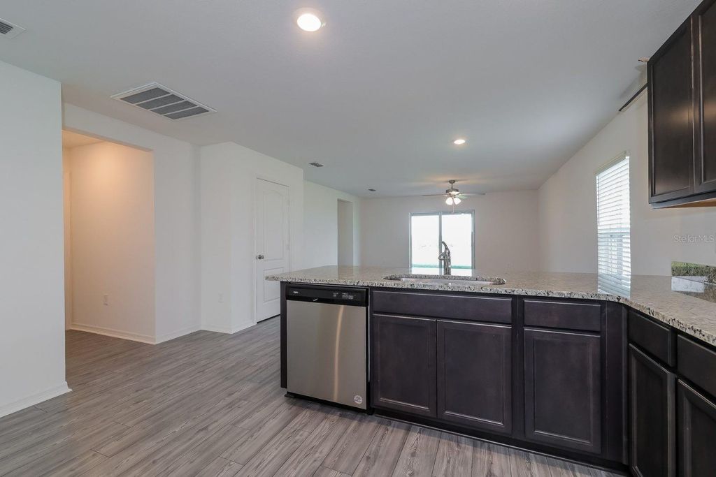 Photo of 429 Kensington View Drive, Winter Haven, FL 33880 (MLS # TB8468775)